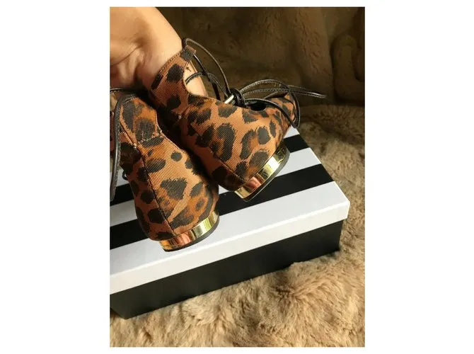 Aquazzura Pisos Christy Castaño Estampado de leopardo 