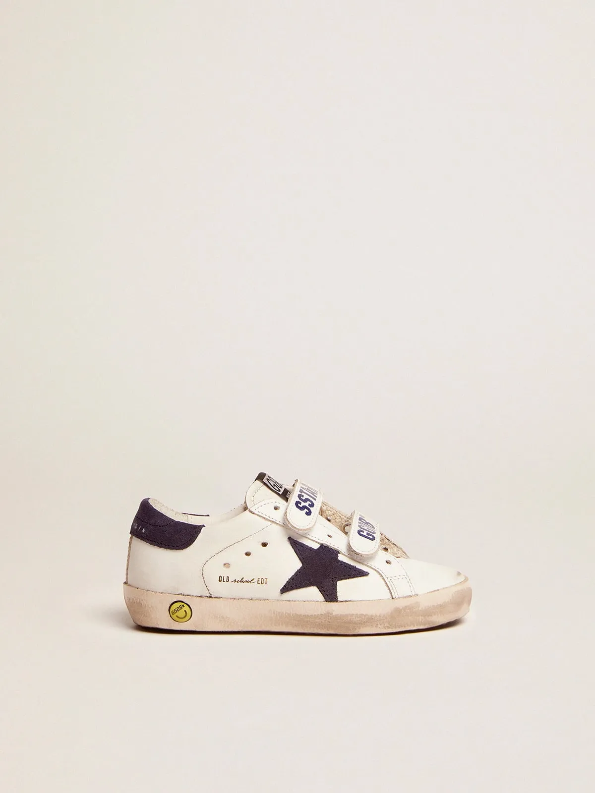 Old School Young de piel blanca con estrella y refuerzo del talón de ante azul