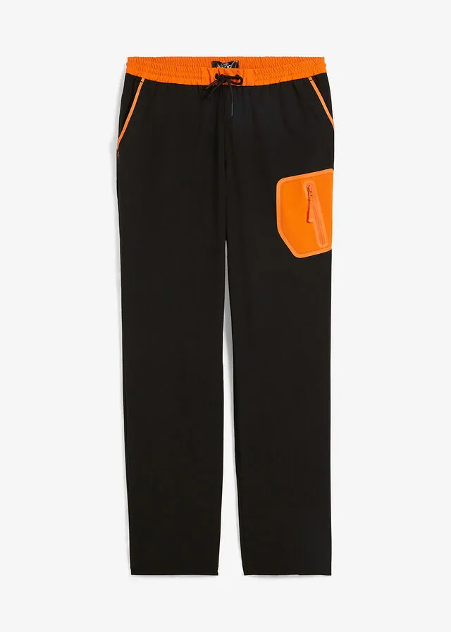Pantalón elástico en 4 direcciones con material impermeable y bolsillos Negro