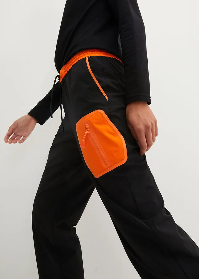 Pantalón elástico en 4 direcciones con material impermeable y bolsillos Negro