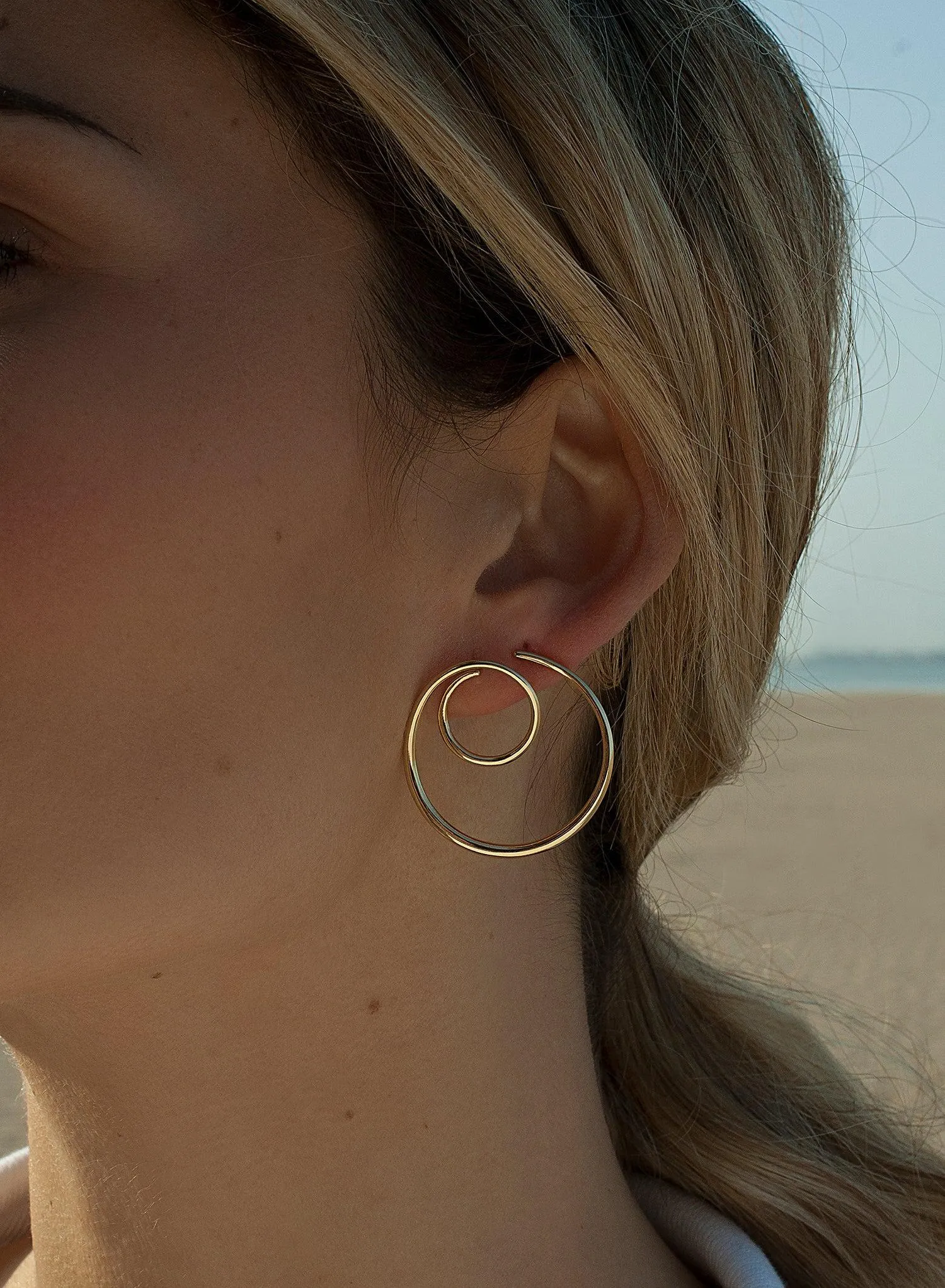 Pendientes originales diseo espiral baados en oro