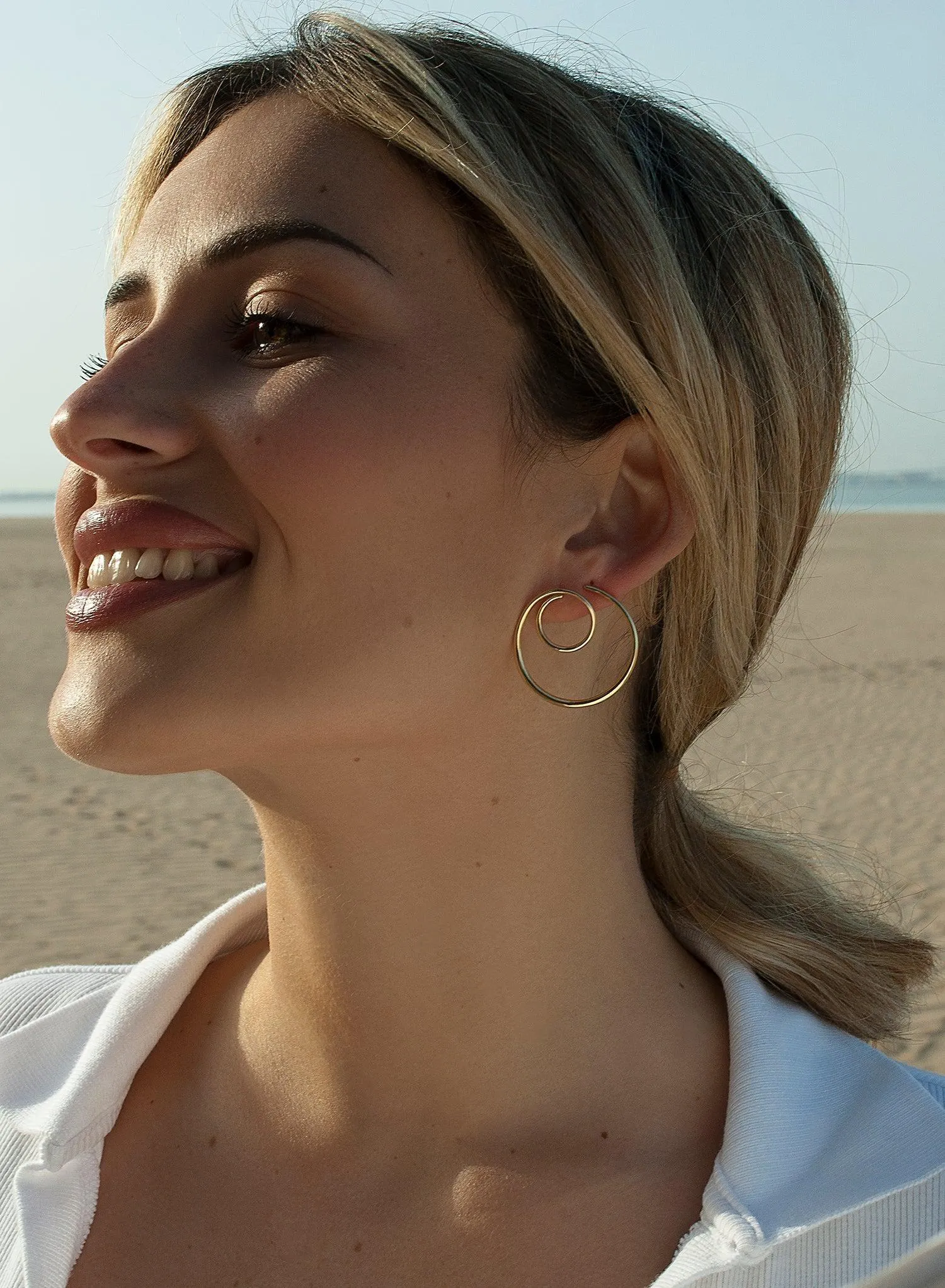 Pendientes originales diseo espiral baados en oro