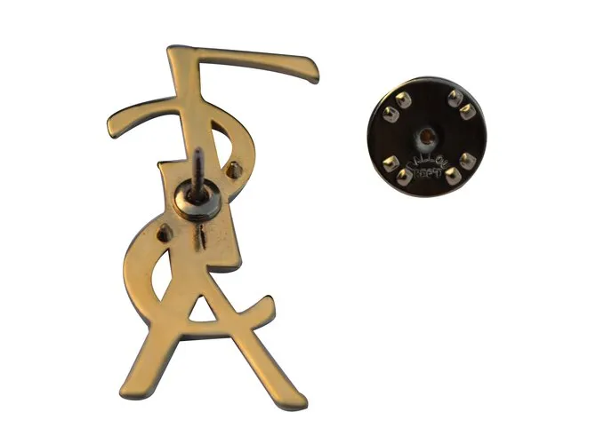 Yves Saint Laurent Broche Dorado 